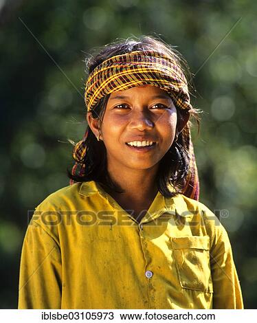 Stock Image - "Portrait of a young girl, Phnom Penh, Phnom Penh Province, Cambodia, Asia". Fotosearch