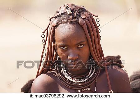 "Portrait of a young Himba with traditional headdress for pregnant women, Kaokoland, Namibia, Africa" View Large Photo Image Stock Image - "Portrait of a young Himba with traditional headdress for pregnant women, Kaokoland, Namibia, Africa". Fotosearch