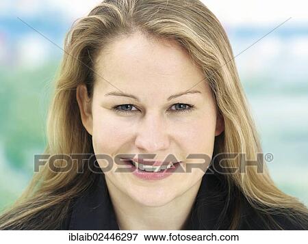 "Portrait of a young woman, smiling" View Large Photo Image Stock Photo - "Portrait of a young woman, smiling". Fotosearch