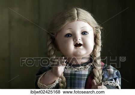Portrait of an antique doll View Large Photo Image Stock Photo - Portrait of an antique doll. Fotosearch