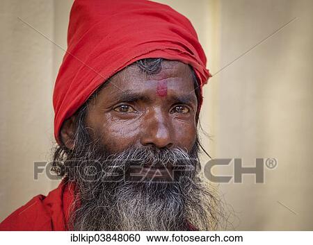 Stock Image - "Portrait of an elderly Sadhu from the Kamakhya Temple, Guwahati, Assam, India, Asia". Fotosearch