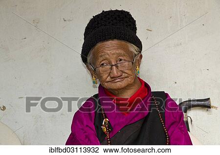 "Portrait of an old local woman, wearing glasses, Junbesi, Solukhumbu District, Sagarmatha Zone, Nepal, Asia" View Large Photo Image Stock Image - "Portrait of an old local woman, wearing glasses, Junbesi, Solukhumbu District, Sagarmatha Zone, Nepal, Asia". Fotosearch