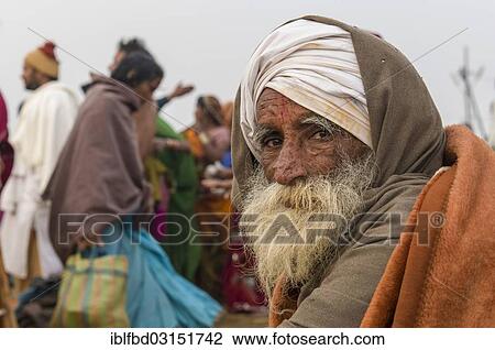 Stock Image - "Portrait of an old man, Kumbha Mela mass Hindu pilgrimage, Allahabad, Uttar Pradesh, India, Asia". Fotosearch