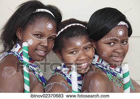 Stock Image - "Portrait of three Xhosa girls with traditional adornment, Grahamstown, Eastern Cape, South Africa, Africa". Fotosearch