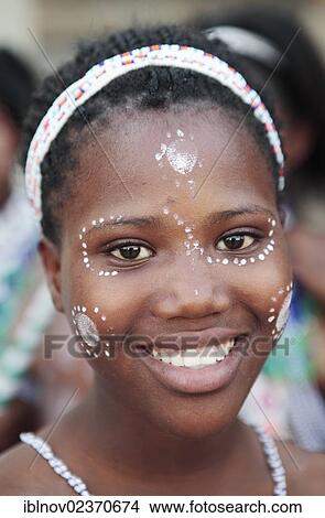 Picture - "Portrait of Xhosa girl with traditional adornment, Grahamstown, Eastern Cape, South Africa, Africa". Fotosearch