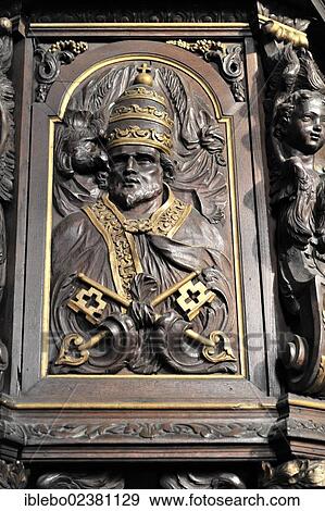 Stock Photo - "Portrait, relief, detail of the carved Baroque pulpit, Parish Church of St. Peter, Rheinberg, North Rhine-Westphalia, Germany, Europe". Fotosearch