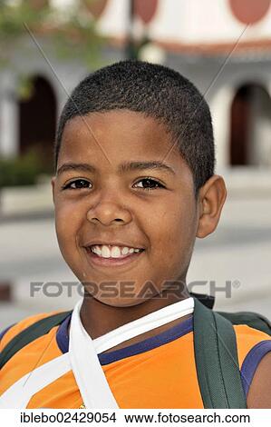 "Portrait, young Cuban boy in the centre of Santa Clara, Cuba, Greater Antilles, Caribbean, Central America, America, North America" View Large Photo Image Picture - "Portrait, young Cuban boy in the centre of Santa Clara, Cuba, Greater Antilles, Caribbean, Central America, America, North America". Fotosearch