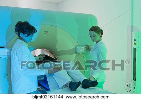 Picture - "Positioning a patient in a computed tomography, CT scanner, Germany, Europe". Fotosearch
