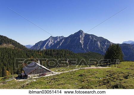 Picture - "Postalmhuette hut on Postalm alpine pasture with Rinnkogel Mountain, Postalm, Postalm, Strobl, Salzkammergut, Salzburg State, Austria, Europe". Fotosearch