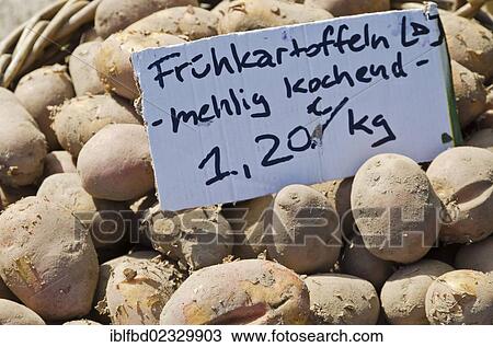 Stock Image - "Potatoes are offered for sale at the weekly market aside the river Elbe. Dresden, Germany, Europe". Fotosearch