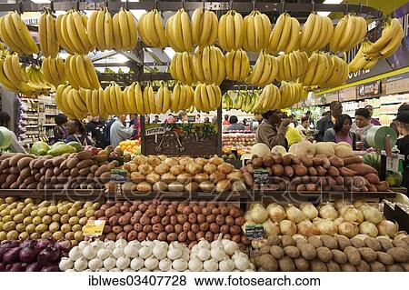 "Potatoes, onions and bananas at a whole foods supermarket, Detroit, Michigan, United States, North America" View Large Photo Image Stock Photo - "Potatoes, onions and bananas at a whole foods supermarket, Detroit, Michigan, United States, North America". Fotosearch