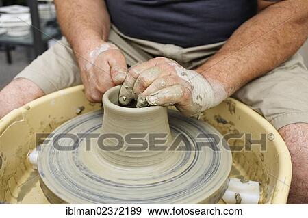 Stock Photo - "Potter, Austrian potters market, Gmunden, Salzkammergut resort area, Traunviertel region, Upper Austria, Austria, Europe". Fotosearch