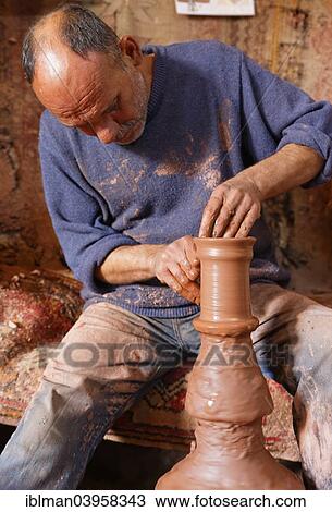 "Potter Hasan Bircan in his pottery Chez Bircan, Avanos, Nevsehir Province, Cappadocia, Central Anatolia Region, Anatolia, Turkey, Asia" View Large Photo Image Stock Image - "Potter Hasan Bircan in his pottery Chez Bircan, Avanos, Nevsehir Province, Cappadocia, Central Anatolia Region, Anatolia, Turkey, Asia". Fotosearch