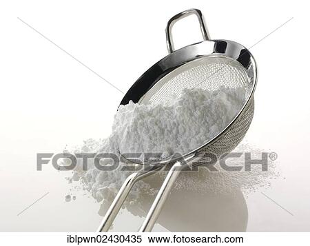 Stock Photography - Powdered sugar in a sieve. Fotosearch