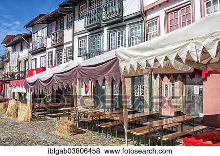 Stock Photo - "Praca de Santiago square during the Afonsina fair, UNESCO World Heritage Site, Guimaraes, Region Norte, Portugal, Europe". Fotosearch
