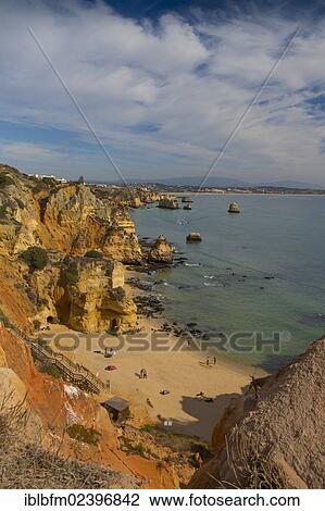 "Praia do Camilo beach with Praia Dona Ana beach at back, Lagos, Algarve, Portugal, Europe" View Large Photo Image Stock Image - "Praia do Camilo beach with Praia Dona Ana beach at back, Lagos, Algarve, Portugal, Europe". Fotosearch