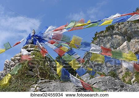 Picture - "Prayer flags behind Hochgernhaus mountain hut, Chiemgau, Bavaria, Germany, Europe". Fotosearch