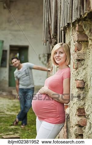 Stock Image - Pregnant woman with her husband. Fotosearch