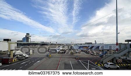 Stock Photography - "Preparation of a passenger plane at Terminal D of Schiphol Airport, Amsterdam, province of North Holland, The Netherlands, Europe". Fotosearch
