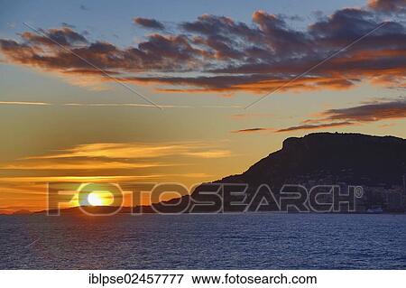 "Principality of Monaco viewed from Cap Martin at sunset, Departement Alpes Maritimes, Region Provence Alpes Cote d'Azur, France, Mediterranean Sea, Europe" View Large Photo Image Stock Photo - "Principality of Monaco viewed from Cap Martin at sunset, Departement Alpes Maritimes, Region Provence Alpes Cote d'Azur, France, Mediterranean Sea, Europe". Fotosearch
