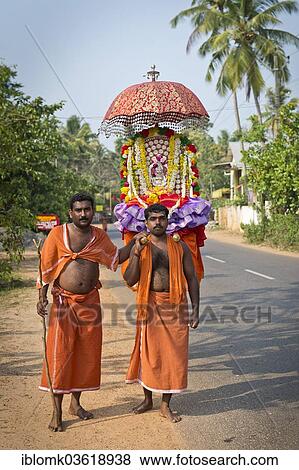 "Procession of Hindu pilgrims in honor of a local patron goddess, Vembanad lake, Kerala, India, Asia" View Large Photo Image Stock Photo - "Procession of Hindu pilgrims in honor of a local patron goddess, Vembanad lake, Kerala, India, Asia". Fotosearch