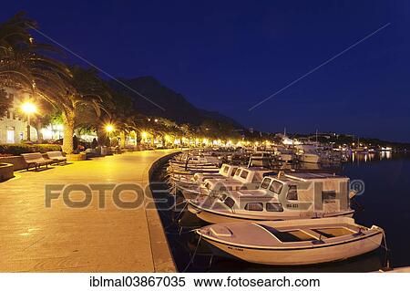 "Promenade and harbour at night, Baska Voda, Makarska Riviera, Adriatic coast, Adriatic Sea, Dalmatia, Croatia, Europe" View Large Photo Image Stock Photography - "Promenade and harbour at night, Baska Voda, Makarska Riviera, Adriatic coast, Adriatic Sea, Dalmatia, Croatia, Europe". Fotosearch