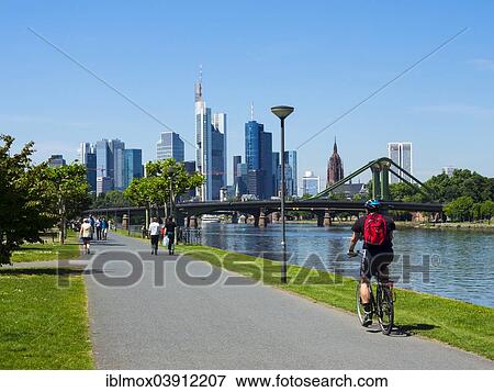 "Promenade on the Main river, skyline of Frankfurt at the back, Frankfurt am Main, Hesse, Germany, Europe" View Large Photo Image Stock Photo - "Promenade on the Main river, skyline of Frankfurt at the back, Frankfurt am Main, Hesse, Germany, Europe". Fotosearch