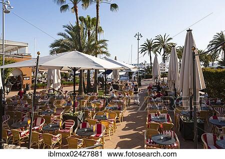 "Promenade with restaurants in Puerto Portals, Puertolas Nous, Majorca, Balearic Islands, Spain, Europe" View Large Photo Image Stock Image - "Promenade with restaurants in Puerto Portals, Puertolas Nous, Majorca, Balearic Islands, Spain, Europe". Fotosearch