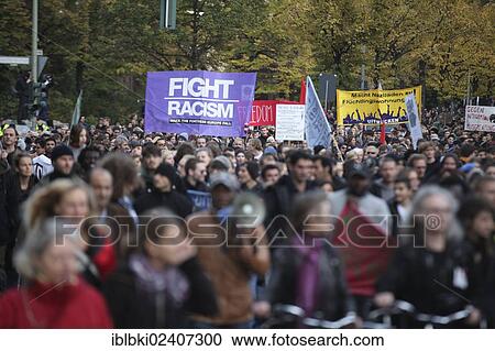 "Protest of refugees in Berlin, several thousand people joining the march to the Reichstag, demanding the right to stay, an end to residential obligations and accommodation in apartments, Berlin, Germany, Europe" View Large Photo Image Stock Image - "Protest of refugees in Berlin, several thousand people joining the march to the Reichstag, demanding the right to stay, an end to residential obligations and accommodation in apartments, Berlin, Germany, Europe". Fotosearch