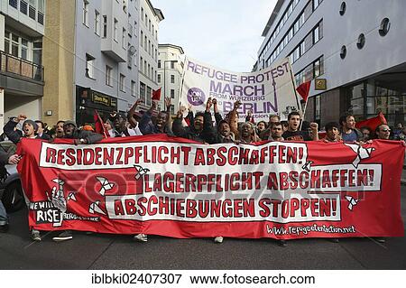 Stock Photo - "Protest of refugees in Berlin, several thousand people joining the march to the Reichstag, demanding the right to stay, an end to cresidential obligations and accommodation in apartments, Berlin, Germany, Europe". Fotosearch