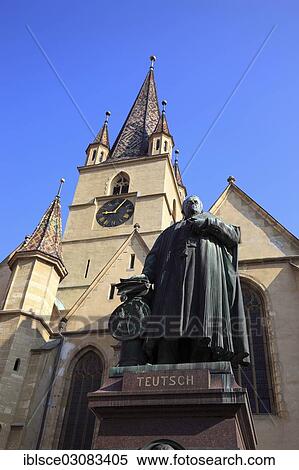 Stock Photography - "Protestant Parish Church and statue of Friedrich Teutsch, 1852 - 1933, a bishop of the Transylvanian Saxons, Sibiu, Hermannstadt, Siebenburgen, Romania, Europe". Fotosearch
