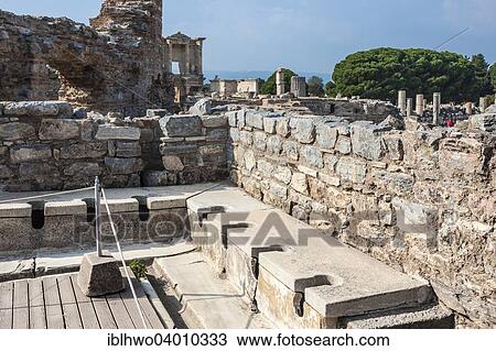 Stock Image - "Public toilets, latrines, ancient city of Ephesus, UNESCO World Heritage Site, Selcuk, Izmir Province, Turkey, Asia". Fotosearch
