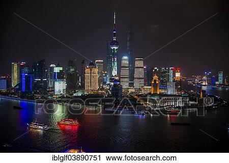 Stock Image - "Pudong on the Huangpo River with the Oriental Pearl Tower, Shanghai, China, Asia". Fotosearch