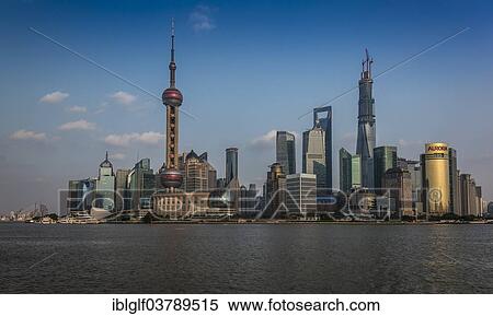 "Pudong skyline with Oriental Pearl Tower, Shanghai World Financial Center and Shanghai Tower, from the Bund, Shanghai, China, Asia" View Large Photo Image Stock Photography - "Pudong skyline with Oriental Pearl Tower, Shanghai World Financial Center and Shanghai Tower, from the Bund, Shanghai, China, Asia". Fotosearch