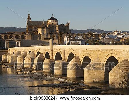 "Puente Romano, spanning the Guadalquivir river, and the Mezquita at the back, Cordoba, Cordoba province, Andalusia, Spain, Europe" View Large Photo Image Stock Photo - "Puente Romano, spanning the Guadalquivir river, and the Mezquita at the back, Cordoba, Cordoba province, Andalusia, Spain, Europe". Fotosearch