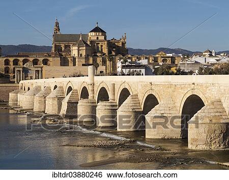 "Puente Romano, spanning the Guadalquivir river, and the Mezquita at the back, Cordoba, Cordoba province, Andalusia, Spain, Europe" View Large Photo Image Stock Photograph - "Puente Romano, spanning the Guadalquivir river, and the Mezquita at the back, Cordoba, Cordoba province, Andalusia, Spain, Europe". Fotosearch