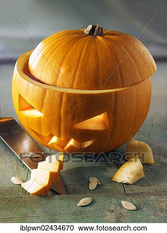 Pumpkin with a traditional carved Halloween face View Large Photo Image Stock Image - Pumpkin with a traditional carved Halloween face. Fotosearch