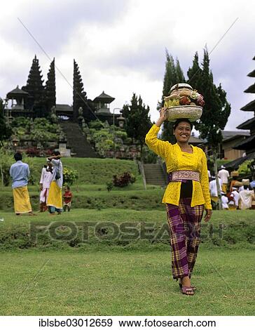 "Pura Besakih Temple, Balinese woman with offerings, procession, Besakih, Bali, Indonesia, Asia" View Large Photo Image Stock Photo - "Pura Besakih Temple, Balinese woman with offerings, procession, Besakih, Bali, Indonesia, Asia". Fotosearch