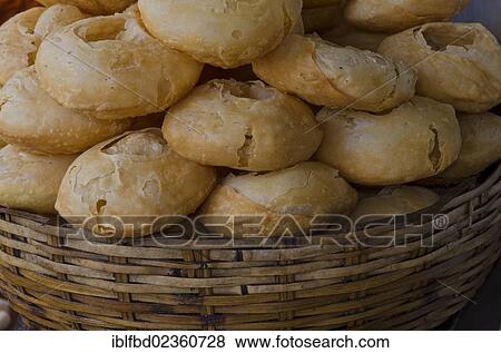 "Puri, fried bread, sold in the streets of Kolkata, India, Asia" View Large Photo Image Stock Photo - "Puri, fried bread, sold in the streets of Kolkata, India, Asia". Fotosearch
