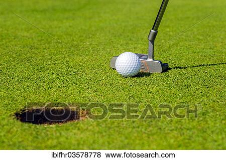 "Putter, golf ball and hole, Golfclub Schloss Myllendonk, Korschenbroich, North Rhine-Westphalia, Germany, Europe" View Large Photo Image Stock Photo - "Putter, golf ball and hole, Golfclub Schloss Myllendonk, Korschenbroich, North Rhine-Westphalia, Germany, Europe". Fotosearch