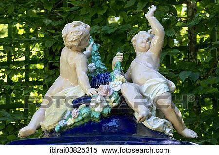 "Putti on an ornamental vessel made of glazed ceramic, West Parterre, Schlosspark palace gardens, Schloss Linderhof Palace, Upper Bavaria, Bavaria, Germany, Europe" View Large Photo Image Stock Photography - "Putti on an ornamental vessel made of glazed ceramic, West Parterre, Schlosspark palace gardens, Schloss Linderhof Palace, Upper Bavaria, Bavaria, Germany, Europe". Fotosearch
