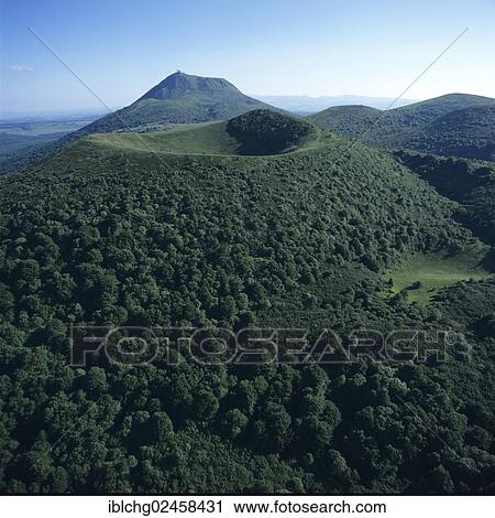 "Puy des Goules in front of Puy de Dome, Auvergne Parc Naturel Regional des Volcans d'Auvergne, Natural regional park of Volcans d'Auvergne, Puy de Dome, Auvergne, France, Europe" View Large Photo Image Stock Image - "Puy des Goules in front of Puy de Dome, Auvergne Parc Naturel Regional des Volcans d'Auvergne, Natural regional park of Volcans d'Auvergne, Puy de Dome, Auvergne, France, Europe". Fotosearch