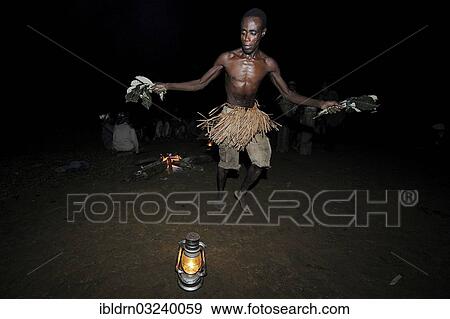 "Pygmy of the Bakoula etnic group from the settlement of Manaya during a ceremony in a forest clearing, Manaya, Lolodorf, South Region, Cameroon, Africa" View Large Photo Image Stock Photo - "Pygmy of the Bakoula etnic group from the settlement of Manaya during a ceremony in a forest clearing, Manaya, Lolodorf, South Region, Cameroon, Africa". Fotosearch