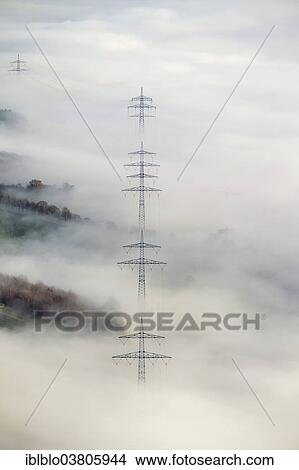 "Pylons in the fog, at Bestwig, Sauerland, North Rhine-Westphalia, Germany, Europe" View Large Photo Image Picture - "Pylons in the fog, at Bestwig, Sauerland, North Rhine-Westphalia, Germany, Europe". Fotosearch