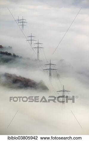 "Pylons in the fog, at Bestwig, Sauerland, North Rhine-Westphalia, Germany, Europe" View Large Photo Image Stock Image - "Pylons in the fog, at Bestwig, Sauerland, North Rhine-Westphalia, Germany, Europe". Fotosearch