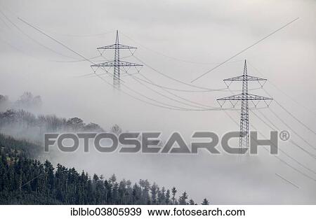 "Pylons in the fog, at Bestwig, Sauerland, North Rhine-Westphalia, Germany, Europe" View Large Photo Image Stock Photo - "Pylons in the fog, at Bestwig, Sauerland, North Rhine-Westphalia, Germany, Europe". Fotosearch