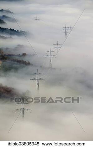 "Pylons in the fog, at Bestwig, Sauerland, North Rhine-Westphalia, Germany, Europe" View Large Photo Image Stock Photography - "Pylons in the fog, at Bestwig, Sauerland, North Rhine-Westphalia, Germany, Europe". Fotosearch