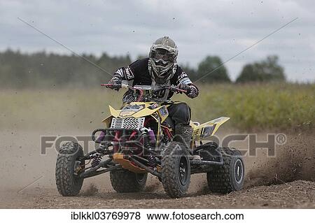 Stock Photo - "Quad rider on a field, Hofen, Lower Allgau, Bavaria, Germany, Europe". Fotosearch