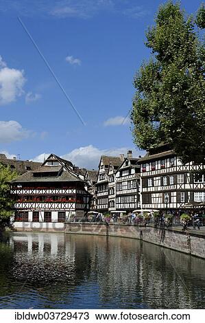 Stock Image - "Quai des Moulins with the L'Ill River, Petite-France, Strasbourg, Departement Bas-Rhin, Alsace, France, Europe". Fotosearch