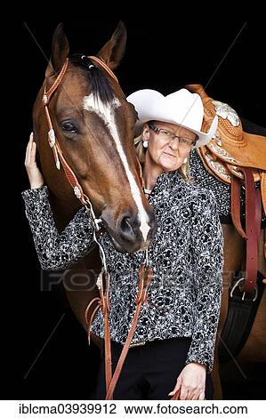 "Quarter Horse, bay gelding, tournament outfit with a female Western rider, at a Wild West Show" View Large Photo Image Stock Image - "Quarter Horse, bay gelding, tournament outfit with a female Western rider, at a Wild West Show". Fotosearch